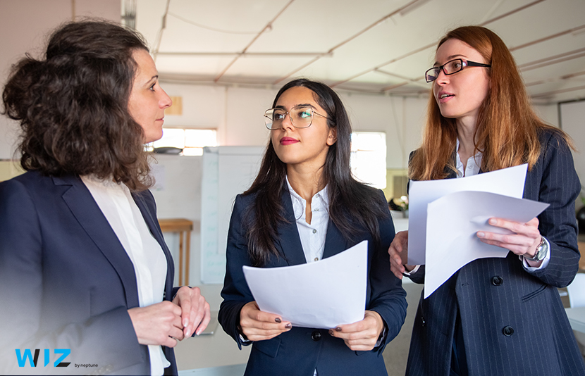 three female staff in corporate wear uniforms